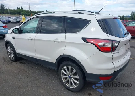 2017 Ford Escape Titanium z USA, uszkodzony, nr VIN 1FMCU9JD3HUD29461